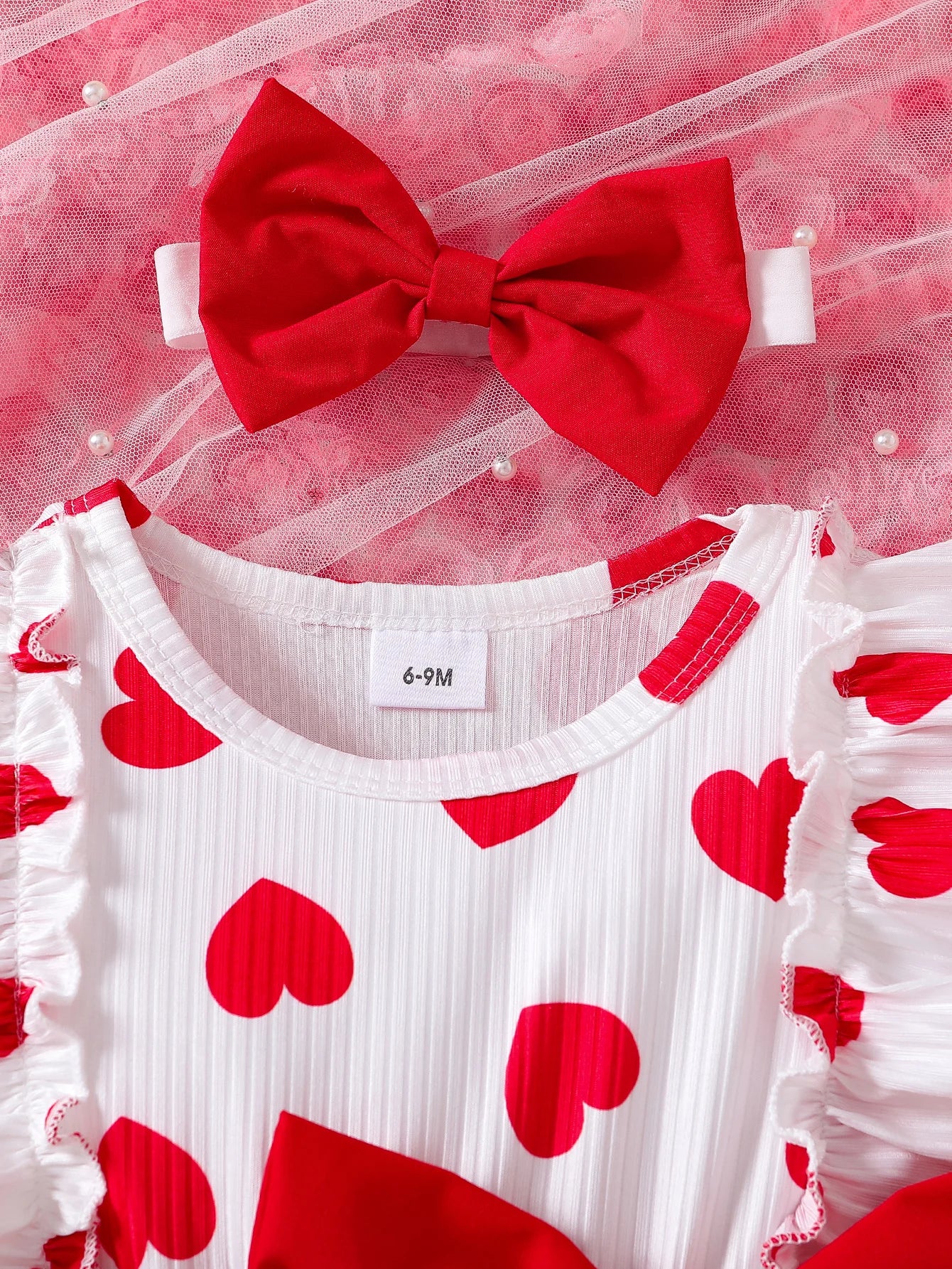 Conjunto de dos piezas con estampado de rayas y cuello redondo para niña pequeña, manga corta, cintura y costados falsos.