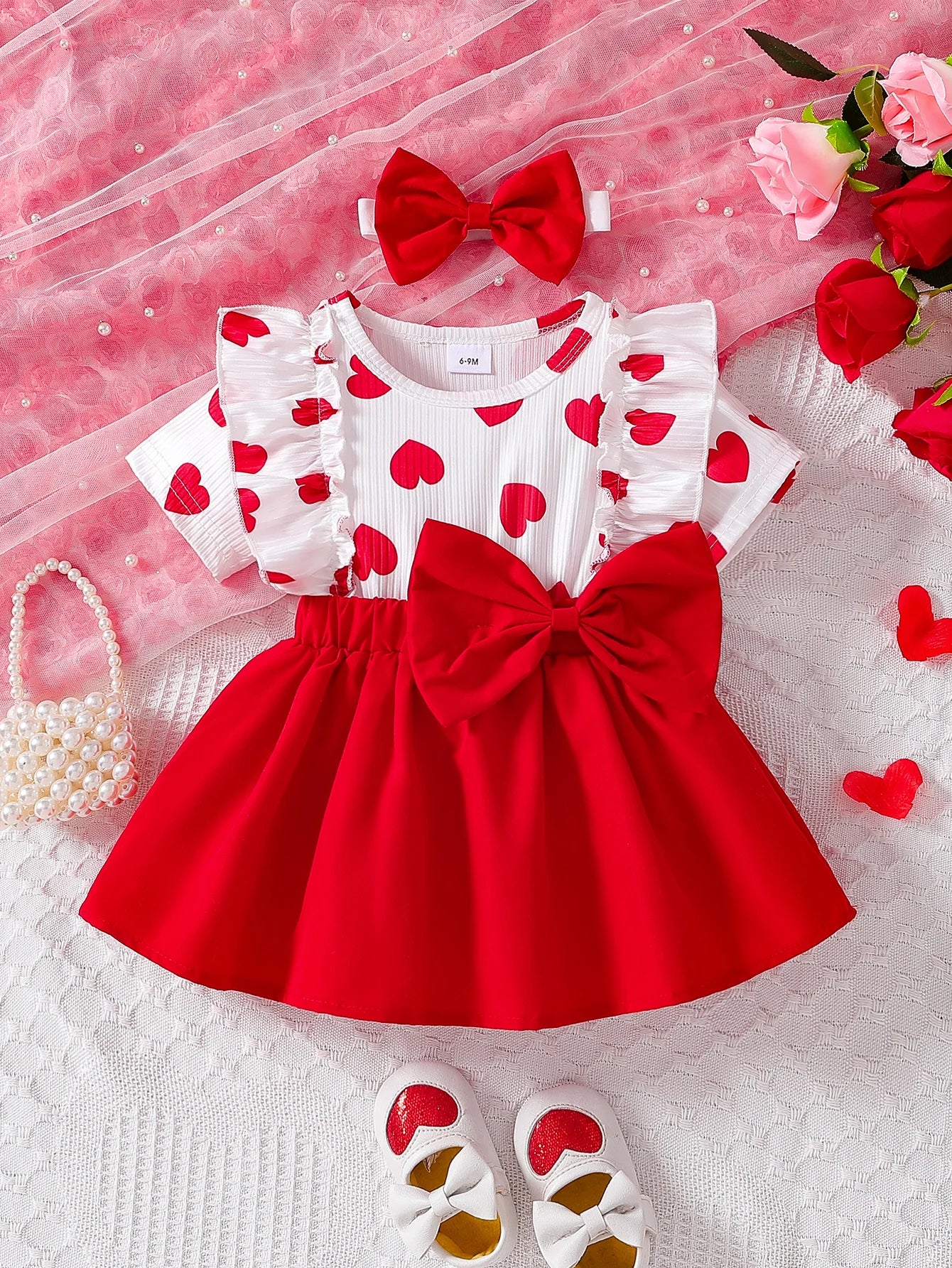 Conjunto de dos piezas con estampado de rayas y cuello redondo para niña pequeña, manga corta, cintura y costados falsos.