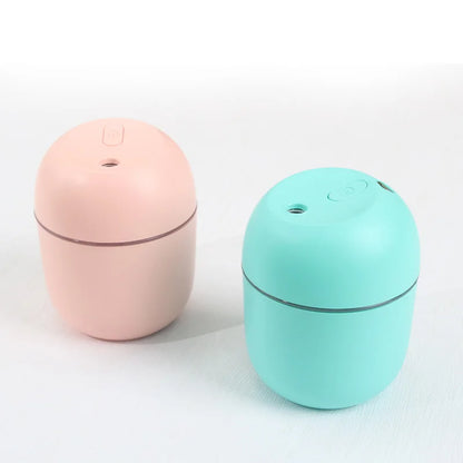 Mini humidificador de aire portátil con forma de gota de agua, USB, de escritorio, para interiores y hogares, silencioso, con atomización de aire.