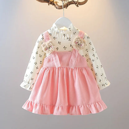 Vestido de manga larga para niña, con estampado floral y tirantes de pana, ideal como atuendo fotográfico para niña de 1 a 6 años.