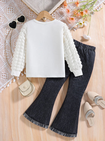 Conjunto de moda para niña de primavera y otoño con cuello redondo blanco, estampado de dibujos animados, manga larga y pantalones adelgazantes de color liso, dos piezas