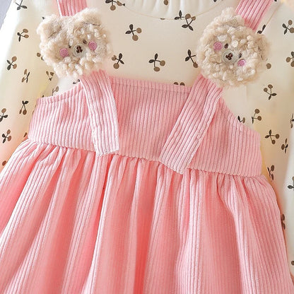 Vestido de manga larga para niña, con estampado floral y tirantes de pana, ideal como atuendo fotográfico para niña de 1 a 6 años.